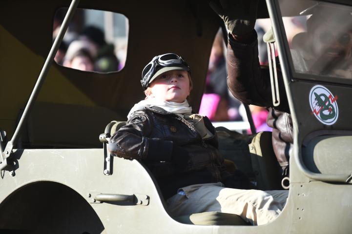 A young aviator rides in a vintage jeep. (John Autey / Pioneer Press)