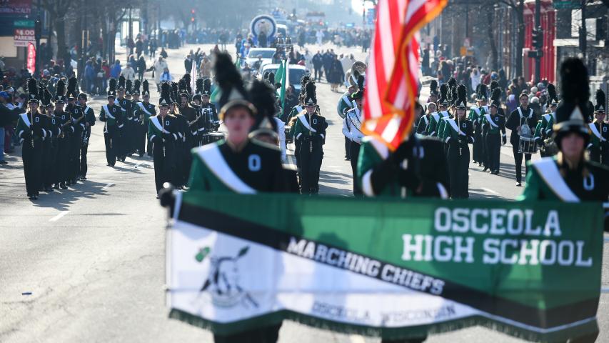The Osceola (Wis.) High School marching band performs along Seventh Street. (John Autey / Pioneer Press)