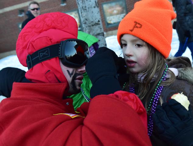 Piper Sutherland, 6, of Vadnais Heights gets a Vulcan V. (John Autey / Pioneer Press)
