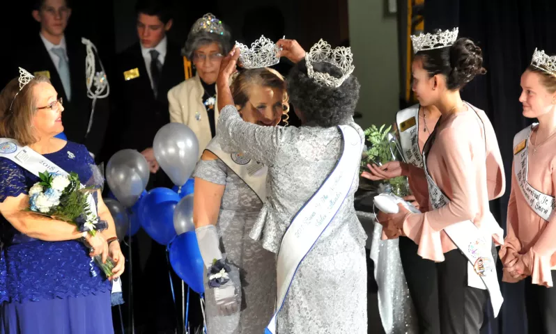 2018 Senior Royalty Queen of the Northlands, Christina Cerecedes, is crowned by last year's Queen, Shirlee Callender, center. (Ginger Pinson / Pioneer Press)