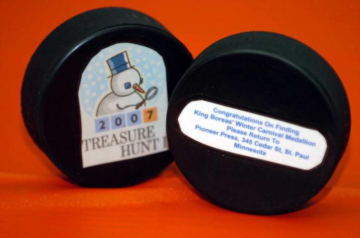These fake medallions were found in Central Park during the 2007 Treasure Hunt. (Pioneer Press file photo)