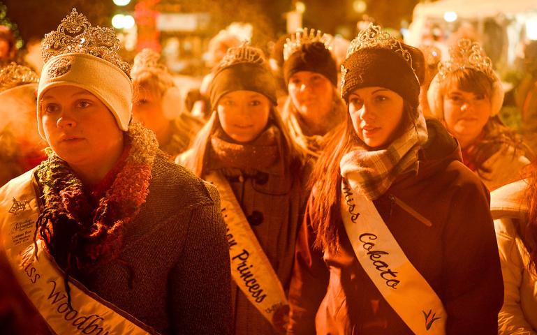 Some of the 87 visiting ambassadors glowed in the firelight from a nearby hot air balloon basket. (Pioneer Press: Ben Garvin)
