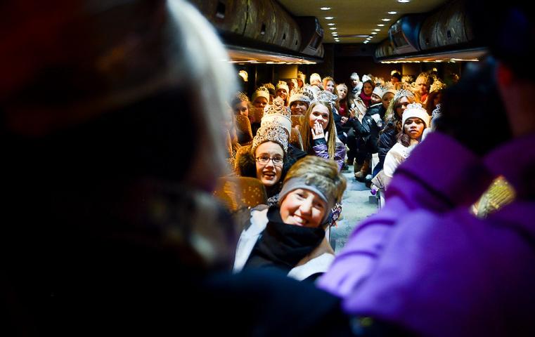 87 visiting ambassadors from other communities warm up on the bus after attending the 128th Saint Paul Winter Carnival Moon Glow Parade at Rice Park in St. Paul on Thursday, January 23, 2014. (Pioneer Press: Ben Garvin)