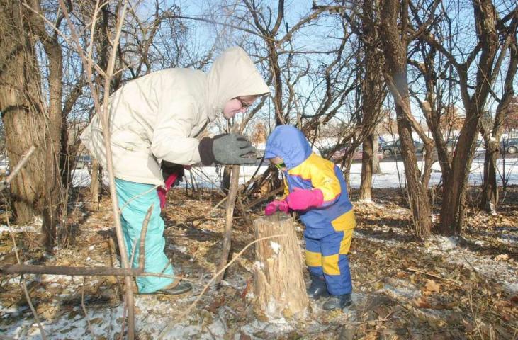 The action was in St. Paul's Como Park during the search for 2003's medallion. Among the hunters were Tammy Leigh and her son, Jackson, 3, who came into St. Paul from the Wright County community of St. Michael. "I grew up in St. Paul," Tammy said, peering into a hollow stump with Jackson, "so we try to get back here for the Treasure Hunt. My grandma used to take us when we were kids, and I'm keeping up the tradition." (Pioneer Press file photo)