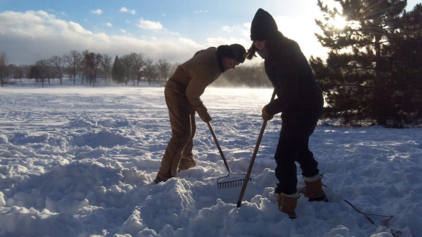Mary and Tom Steiner of Roseville clear snow in Como Park on Sunday, looking for the St. Paul Pioneer Press Treasure Hunt medallion. “Here’s how the deal works: She gets the park figured out -- she’s really good at that -- and then when we’re in the park, I help her find something that looks like you could write clues off of it.” (Pioneer Press: John Brewer)