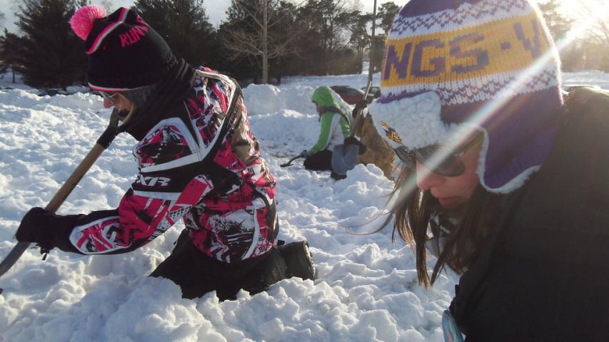 Nicole Hinzie of Hugo and Richelle Nelson of Richfield dig in the snow Sunday at Como Park looking for the St. Paul Pioneer Press Treasure Hunt medallion. Hinzie has been searching since she was a child and got her friend Nelson interested in the hunt. (Pioneer Press: John Brewer)
