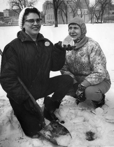 In 1966, the prize was called a medal. Winners Peggy Fritzke and Iola Mossbrugger display it where they found it on Harriet Island. (Pioneer Press file photo)