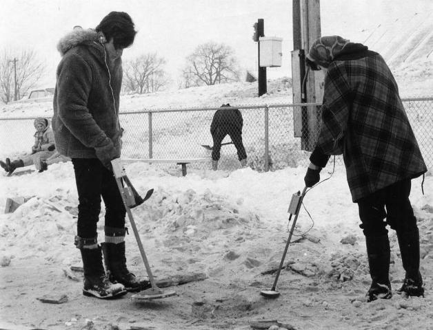 Don Deutsch of Maplewood and Judy Strand of St. Paul search Wakefield Park with metal detectors in 1971. (Pioneer Press file photo)