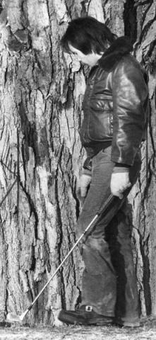 Ed Terry of St. Paul took a swing at finding the medallion with a golf club during the 1978 hunt. (Pioneer Press file photo)