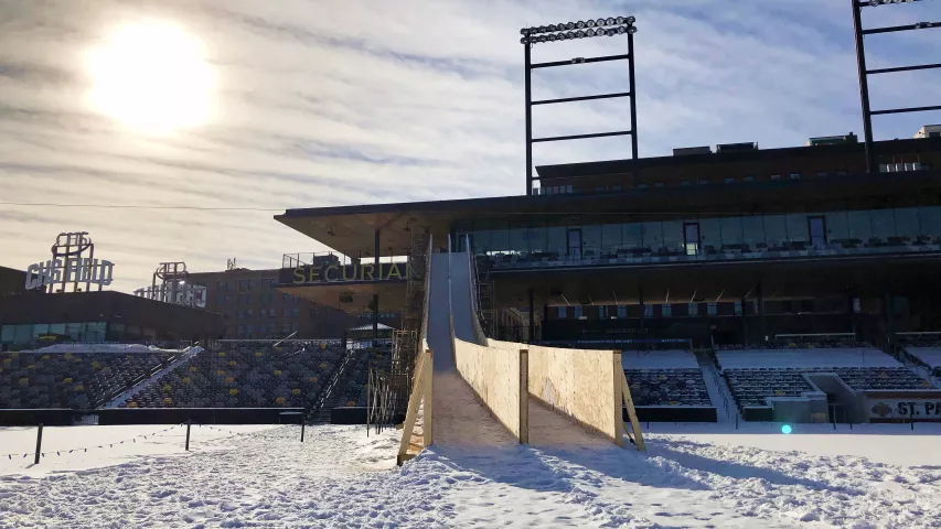 The St. Paul Saints, who have held concerts, tailgating and winter baseball games in January, have really gone downhill this winter. CHS Field has a Super Slide snow slide that starts at the second story patio of the Securian Club set up to celebrate the Super Bowl and the Winter Carnival in St. Paul. (Pioneer Press / Julio Ojeda-Zapata)
