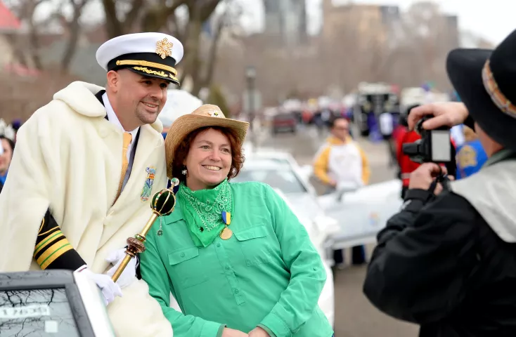 Parade participants have their photo taken with Jim Flaherty, who was introduced as King Boreas LXXX before the start of the St. Paul Winter Carnival Grande Day Parade on Jan. 30. (Pioneer Press: John Autey)