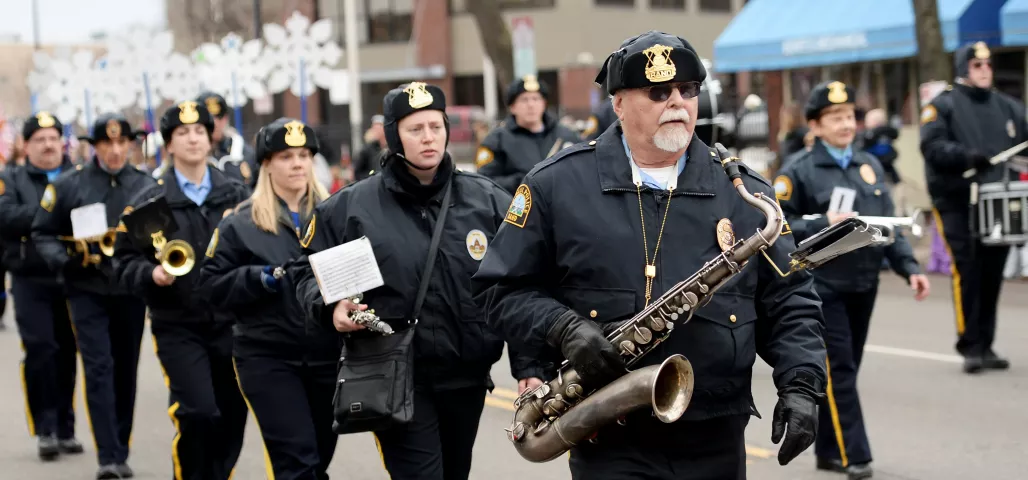 Members of the St. Paul Police Band march along West 7th in the St. Paul Winter Carnival Grande Day Parade in St. Paul on Jan. 30. (Pioneer Press: John Autey)