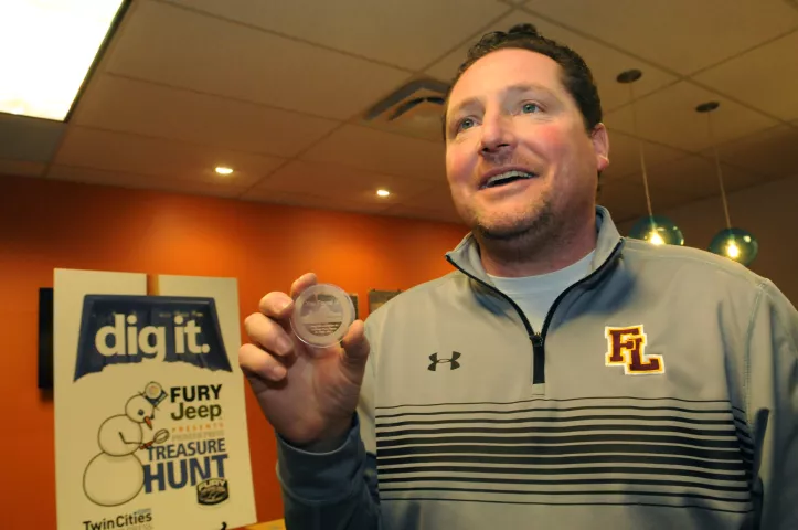 Jerome Krieger winner of the 2017 Pioneer Press Treasure Hunt shows off the 2017 Pioneer Press Treasure Hunt Medallion in the lobby at the Pioneer Press on Monday, January 30, 2017. Krieger found the medallion at Keller Lake Regional Park on Monday around 3:30 PM. (Pioneer Press: Ginger Pinson)