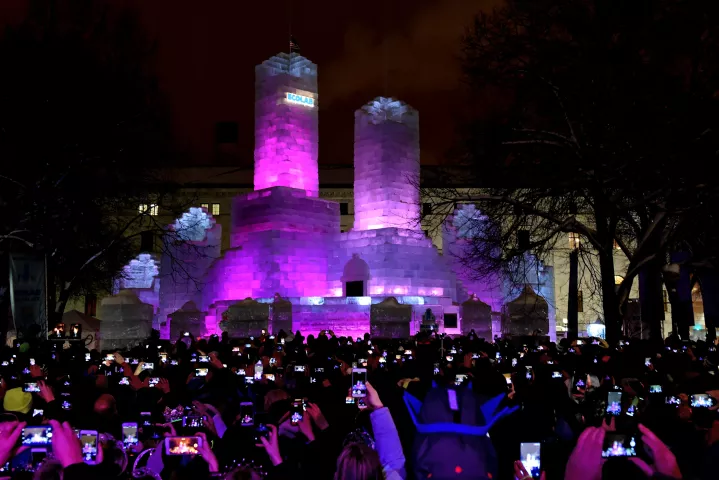 The ice palace is lit after the St. Paul Winter Carnival Moon Glow Pedestrian Parade in St. Paul on Thursday, Jan. 25, 2018. (Jean Pieri / Pioneer Press)