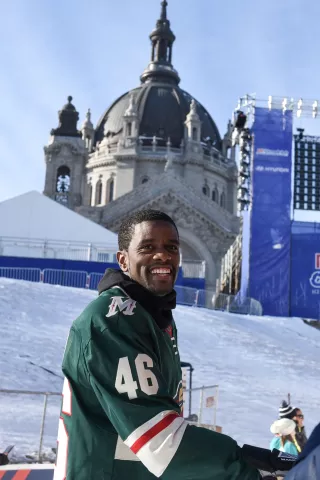 St. Paul Mayor Melvin Carter smiles after skating down the Red Bull Crashed Ice track in St. Paul on Thursday, Jan. 18, 2018. Carter, wearing a Minnesota Wild jersey with his name on the back, took several runs down sections of track. (Andy Rathbun / Pioneer Press)