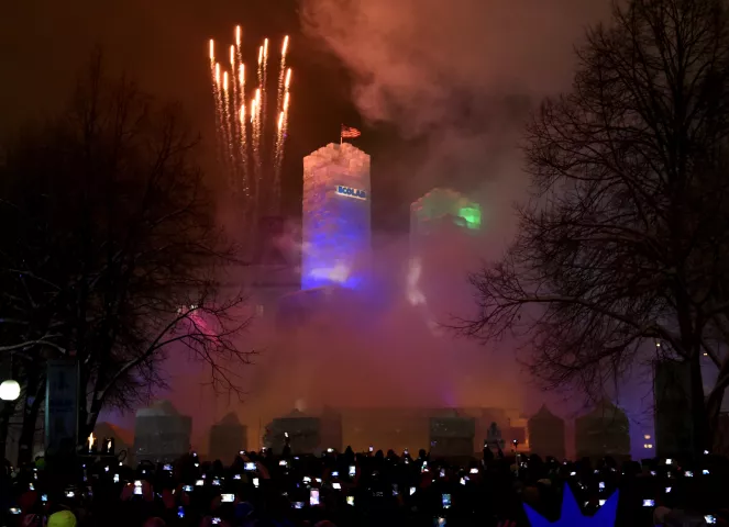 The Winter Carnival ice palace is lit and fireworks go off after the Carnival Moon Glow Pedestrian Parade in St. Paul on Thursday, Jan. 25, 2018. The 4,000-block, 70-foot-tall Ice Palace was built to welcome the world to Minnesota for the Super Bowl and placed in Rice Park for the 17-day Carnival. The Winter Carnival has built 36 Ice Palaces with the first one in 1885. (Jean Pieri / Pioneer Press)