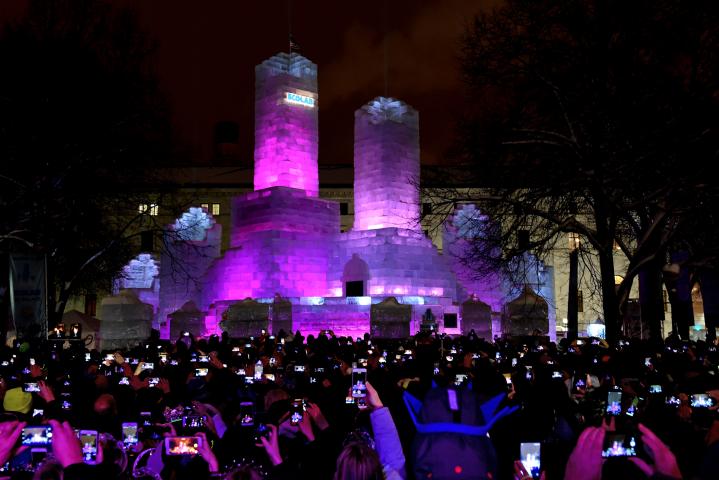The ice palace is lit after the St. Paul Winter Carnival Moon Glow Pedestrian Parade in St. Paul on Thursday, Jan. 25, 2018. (Jean Pieri / Pioneer Press)