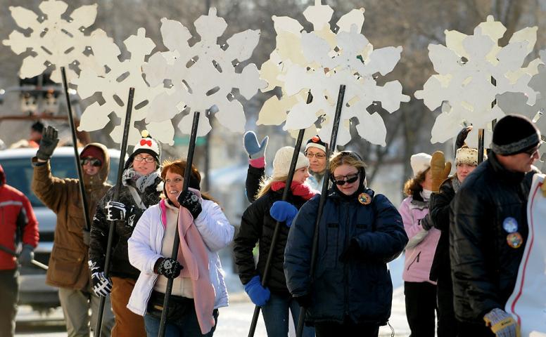 Snowflakes marched in the Winter Carnival Grande Day Parade in St. Paul, Saturday January 25, 2014. (Pioneer Press