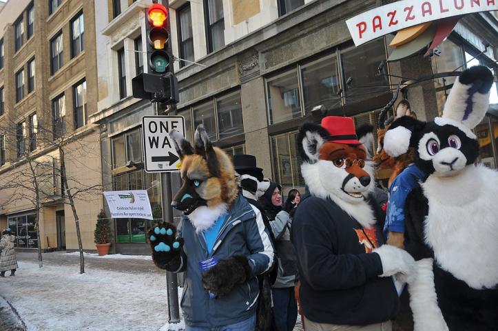 Parade marchers from Minnesota Fur gather together by Pazzaluna at the end of the Winter Carnival Grande Day Parade in St. Paul, Saturday January 25, 2014. (Pioneer Press: Jean Pieri)