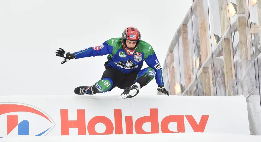 Maxwell Dunne of Burnsville keeps low as he flies over a jump on the course during a Red Bull Crashed Ice practice session at the Cathedral of St. Paul in St. Paul on Friday, Jan. 19, 2018. The course drops some 12 stories over its 1,600 foot run. (John Autey / Pioneer Press)