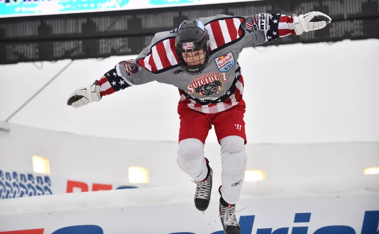 Nathan Radke leaps off the first turn of the course during a Red Bull Crashed Ice practice session at the Cathedral of St. Paul in St. Paul on Friday, Jan. 19, 2018. (John Autey / Pioneer Press)