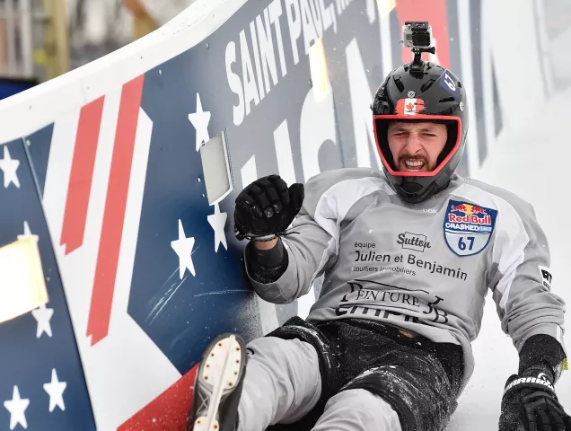 Canadian Simon Foley reacts after hitting the wall hard on first big drop of the course during a Red Bull Crashed Ice practice session at the Cathedral of St. Paul in St. Paul on Friday, Jan. 19, 2018. (John Autey / Pioneer Press)