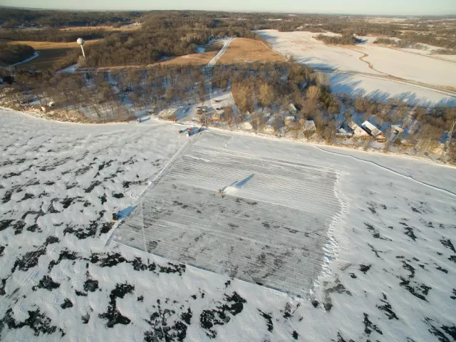 An area of Green Lake near Spicer, Minn., is cleared of snow Monday, Jan. 1, 2018, in preparation for ice harvest. About 4,000 blocks of ice will be cut from the lake for construction of the St. Paul Winter Carnival Ice Palace in Rice Park. (Courtesy of Darrin Johnson / St. Paul Winter Carnival)