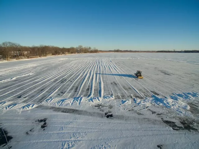 A team of people from Park Construction, Park Avenue Trucking, Xcel Energy and Wee Kut will take part in the ice block project. (Courtesy of Darrin Johnson / St. Paul Winter Carnival)