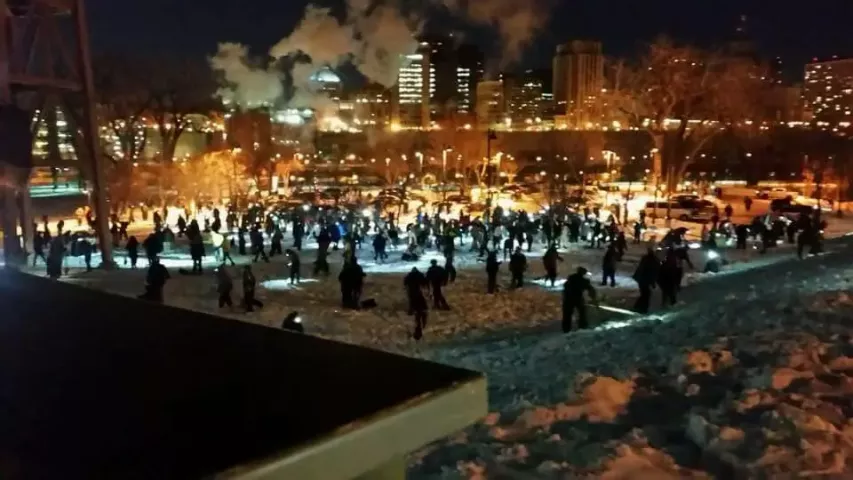 Treasure Hunters fill Harriet Island Regional Park’s great lawn just after the final clue was released about 10:30 p.m. Wednesday, Jan. 31, 2017. (Photo courtesy of Brendan Tighe)