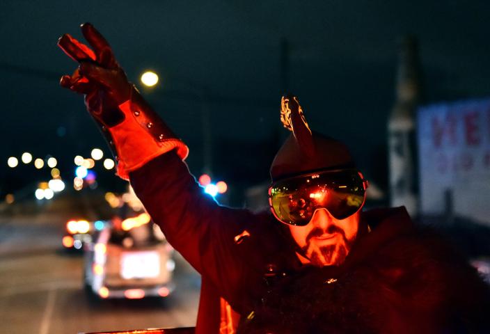 Vulcanus Rex LXXXI leads his caravan during the "Hot Time In Rice Park" parade down Seventh Street in St. Paul on Friday. (John Autey / Pioneer Press)