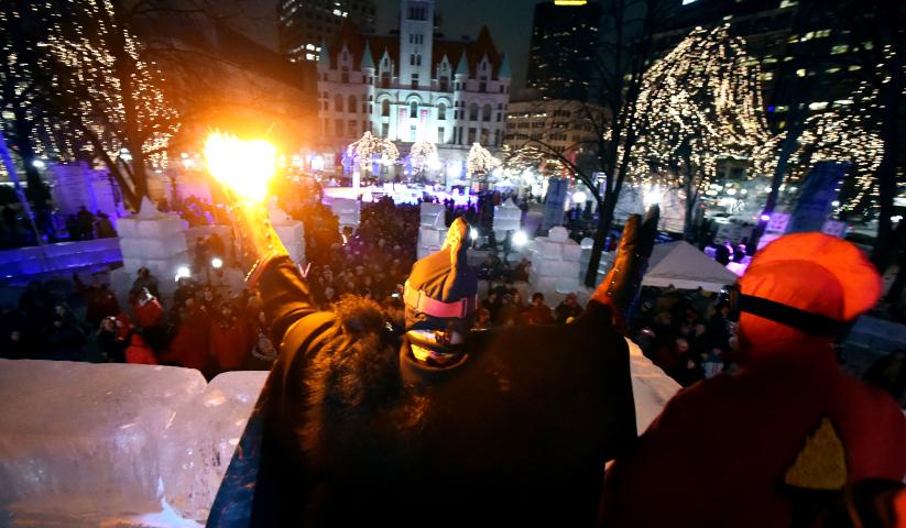 Vulcanus Rex LXXXI waves to the crowd as the Vulcan Krewe arrives in Rice Park for their assault on the St. Paul Winter Carnival Ice Palace. (John Autey / Pioneer Press)