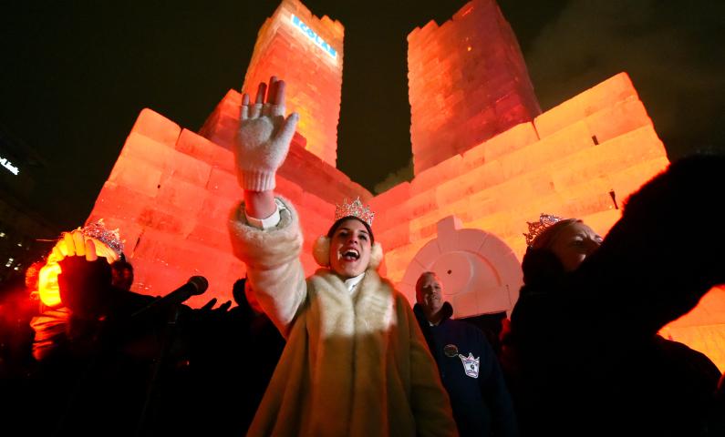 Aurora, Queen of the Snows, sings away the Vulcans after they attempt to take over the St. Paul Winter Carnival Ice Palace in Rice Park. (John Autey / Pioneer Press)