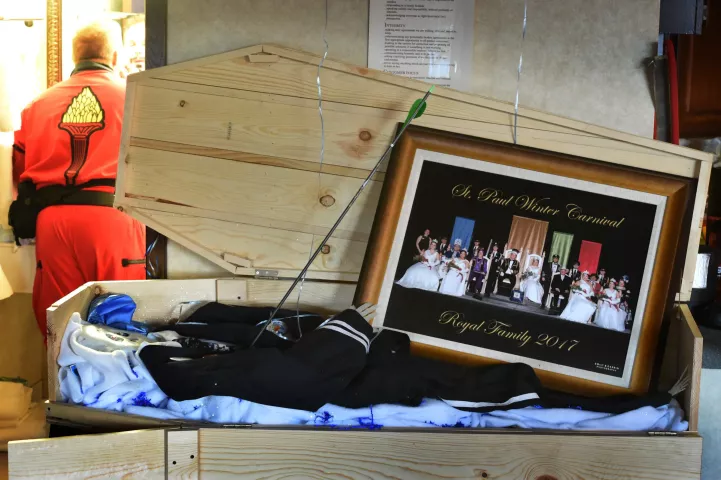 The Vulcans have this prop in their "den" -- a Royal Guard in a faux coffin -- that they made in jest for King Boreas, Jason Bradshaw, who is a funeral director in real life. The Vulcans said they stole the photo of the Royal Family and replaced it with a Vulcan Krewe picture. (Pioneer Press: Jean Pieri)