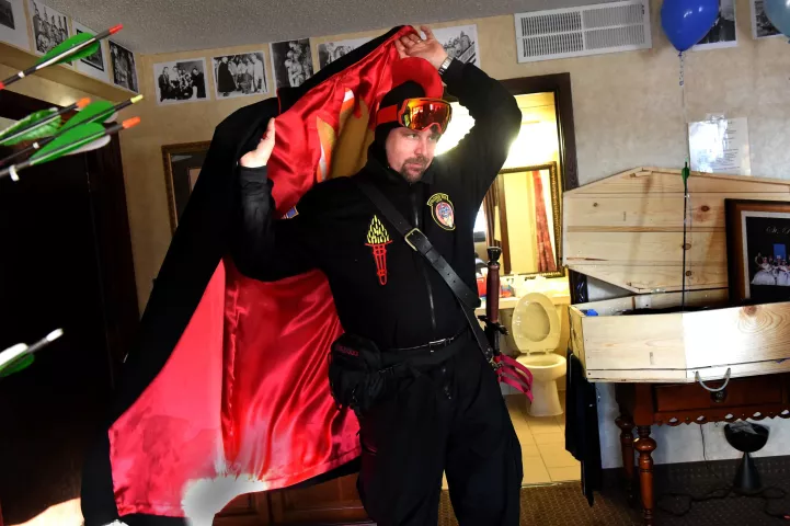 David Breen, Vulcanus Rex, gets ready to go out with the Vulcan Krewe. Breen, who has been with the Roseville Fire Department for 25 years, said that the inside of his cape is part of an old fire jacket. (Pioneer Press: Jean Pieri)
