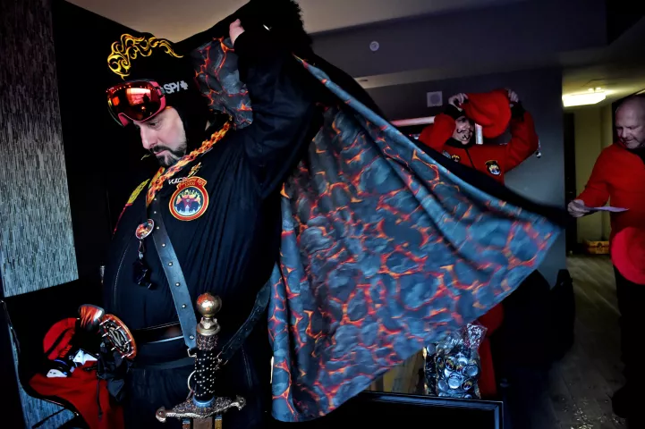 Tommy Cherep, the St. Paul Winter Carnival Vulcanus Rex 81, puts his cape on before heading out with his crew in St. Paul Wednesday, Jan. 31, 2018. (Jean Pieri / Pioneer Press)