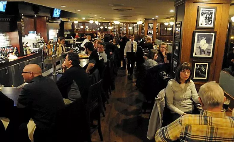 Happy Hour fills the bar area of Louis Ristorante &amp; Bar, located on the third floor of the newly renovated Cossetta Alimentari, St. Paul, Minnesota, Friday, January 11, 2012. (Pioneer Press: John Autey)