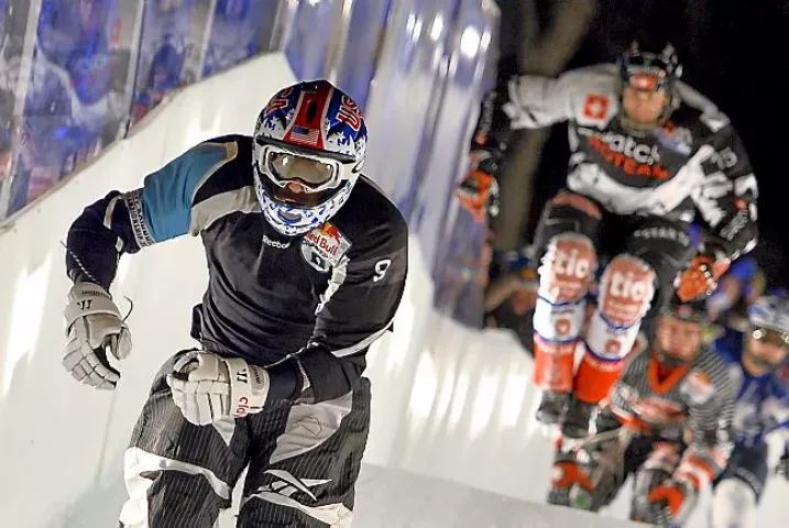 USA’s Cameron Naasz, left, skates to win ahead of Switzerland’s Kim Mueller during the final race of the Ice Cross Downhill World Championship at the Red Bull Crashed Ice, on March 2, 2013 in the old town of Lausanne, western Switzerland. (AFP/Getty Images: Fabrice Coffrini)