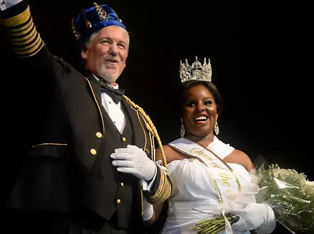 King Boreas Daniel E. Stoltz, left, and Aurora, Queen of Snows Krystle Igbo-Ogbonna during the St. Paul Winter Carnival Royal Coronation at the RiverCentre in St. Paul on Friday, Jan. 23, 2015. (Pioneer Press: John Autey)