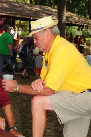Gil Hartman tells a story about how close he was to finding the Heimatfest medallion. Instead, Lucille Hogan made the winning find. PHOTO BY RON MORNSON
