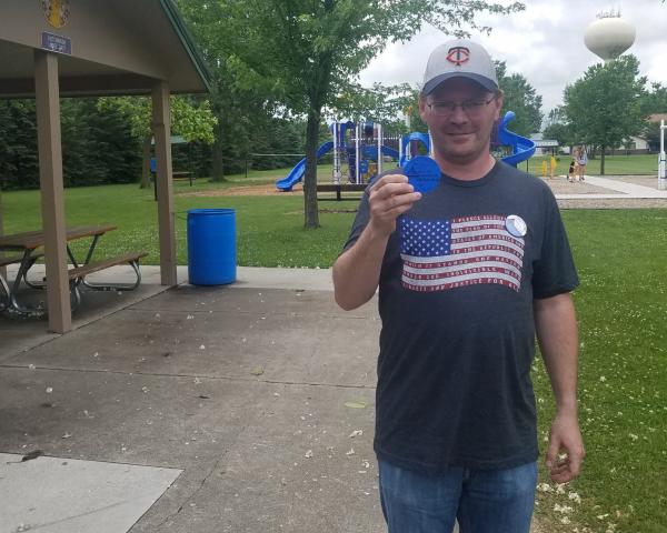 Neil Branstad earned a nice birthday present on Tuesday when he found the Water Carnival medallion at Elks Park.  Staff photo by Jeremy Jones