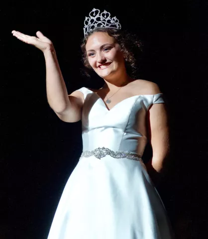 Miss Litchfield Cecilia Toenjes gives a final wave to the crowd at Bernie Aaker Auditorium as she ended her reign Sunday.