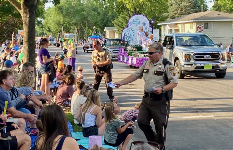 Meeker County Sheriff’s Office deputies and reservists handed out information and chatted with parade-goers.
