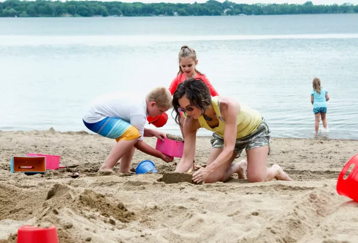 Kids build a sand castle