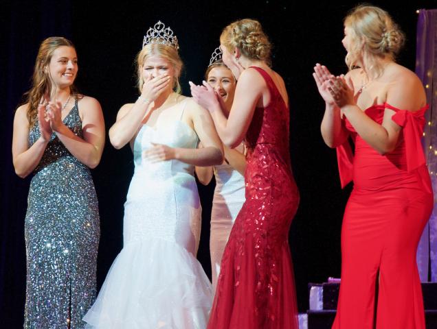 Newly crowned Miss Litchfield Raina Kaping sheds tears of happiness as candidates Kaylee Sundve, Britney Prahl and Claire Loch applaud during coronation Sunday at Bernie Aaker Auditorium. STAFF PHOTOS BY BRENT SCHACHERER