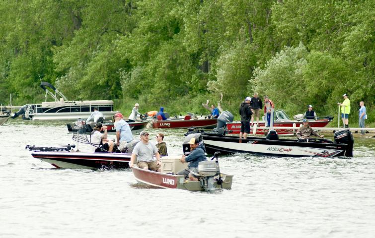 Boats wait to be released at the start of the Watercade fishing tournament on Lake Ripley. The lake on the south end of Litchfield is a popular destination for locals, as well as vacationers, who enjoy fishing, swimming and sunning on the beach.