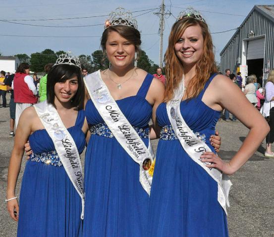 Kaytlin Bemis, 2012-2013 Miss Litchfield, places the crown on Kristen Klaben at the queen coronation at Bernie Aaker Auditorium during last year’s Watercade celebration.