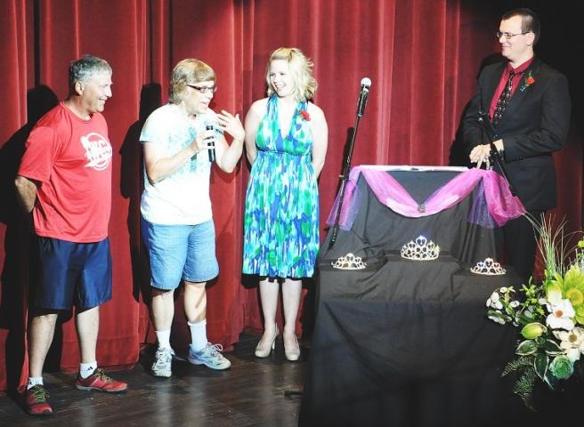 A Volunteer of the Year award was given to Dave and Jan Schlack at the queen coronation Sunday night at Bernie Aaker Auditorium. The Watercade Board of Directors picked the Schlacks to receive the award, which is sponsored by the Minneapolis Aquatennial Association. The Schlacks were given the award for their volunteer efforts, which include volunteering for the Meeker County Food Shelf, Relay for Life, Habitat for Humanity, Boy Scouts, Adopt A Highway and Salvation Army, where they raise on average $17,000