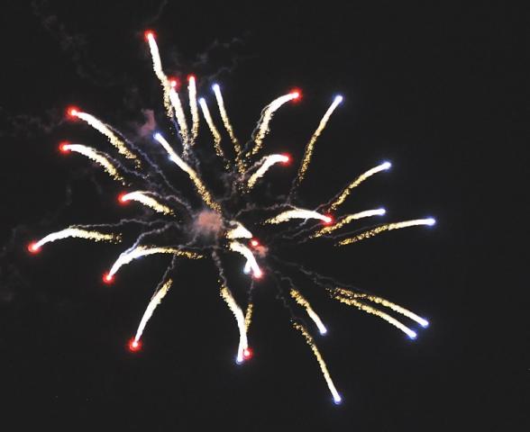 Sparkling fireworks blast over Lake Ripley during the Watercade firework display Friday night.