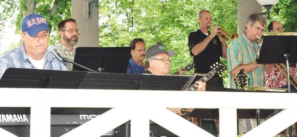Members of Mill Pond Jazz Orchestra perform “What a Wonderful World” in Litchfield Central Park on Saturday. Pictured, from left to right, are Brian Daniel, John Twernbold, Brian Pearson, Steve Bresnaham, Dave Ceasar, Tim Pieh, and Mill Pond Jazz Orchestra director Mark Freitas.