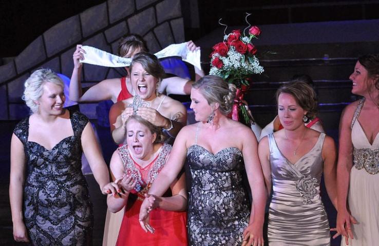 Kristen Klaben, 2013-2014 Miss Litchfield, places a crown on the head of 2014 Litchfield High School graduate Ali Richardson. Also pictured, from left to right, are candidates Madison Westphal, Alana Caron, Alyssa Raiber and Riley Anderson. 2013-2014 princess Paige Dilley is pictured holding the sash.